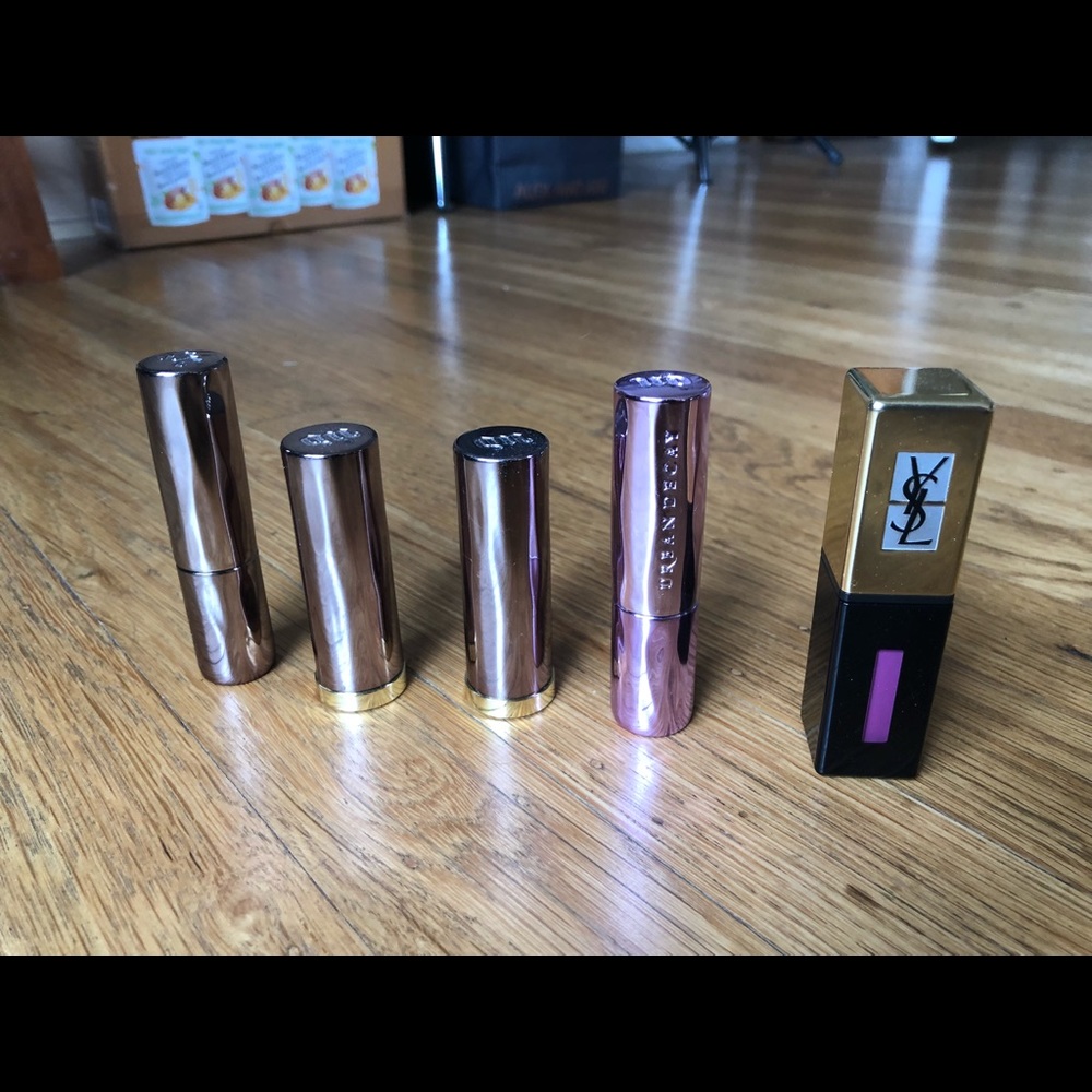 1 YSL lipgloss and 4 urban decay lipsticks